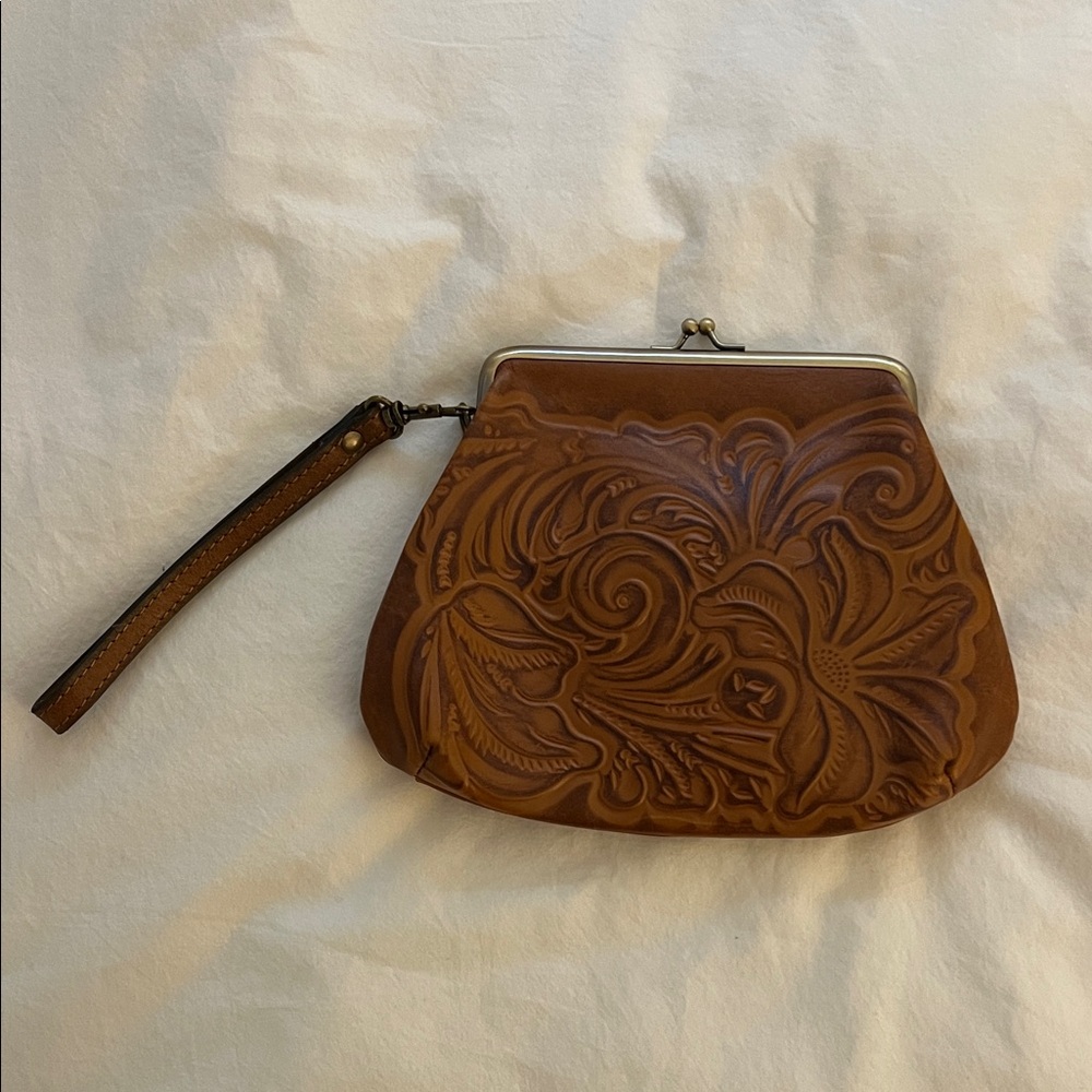 Brown leather clutch
